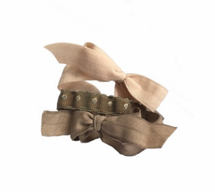 Fawn Set by Bandtz in pile. Five Bandtz hair elastics in nude, khaki, cargo green color combination. Three matte hair bows, two demi dot hair bands. Hair accessory with strong hold. Best hair ties for thick hair and curly hair. 