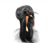 Brunette wearing gold Satin Long Tail hair band by Bandtz. Elastic ribbon made for the hair. 