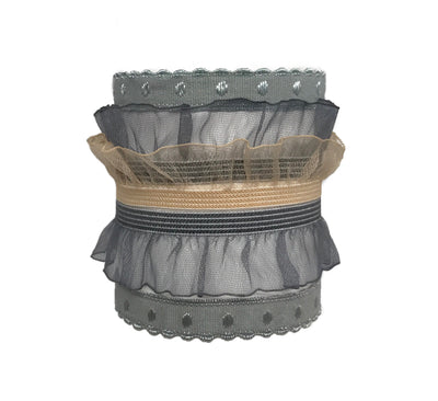 Coco Set in Grey. Five Bandtz hair bands. Elastic organza ruffle, scalloped elastic with shimmer dots. Great for delicate hair. Sexy hair ties that look like a garter on the wrist.